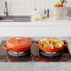 The enamel cast iron soup pot features a circular shower-style lid design and is suitable for various tools, such as ceramic, gas